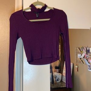 Purple cropped long sleeve shirt.